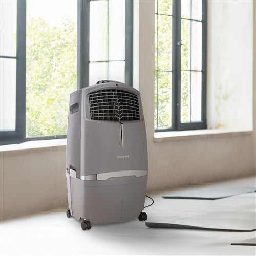 Honeywell 525 CFM Indoor/Outdoor Evaporative Air Cooler (Swamp Cooler) with Remote Control in Gray Honeywell 525 CFM Indoor/Outdoor Evaporative Air Cooler (Swamp Cooler) with Remote Control in Gray