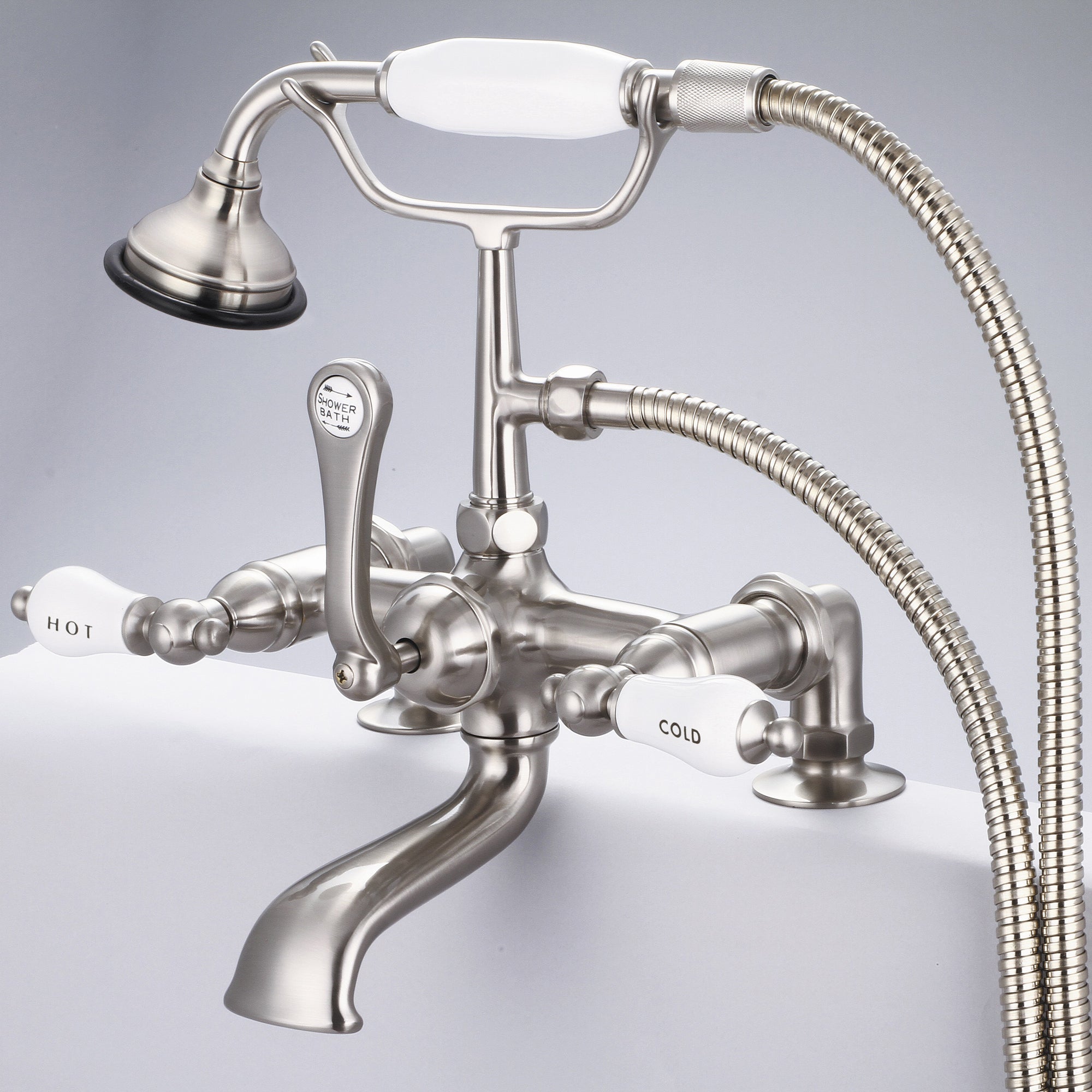 Water Creation | Vintage Classic 7 Inch Spread Deck Mount Tub Faucet With 2 Inch Risers & Handheld Shower in Brushed Nickel Finish With Porcelain Lever Handles, Hot And Cold Labels Included | F6-0007-02-CL Water Creation | Vintage Classic 7 Inch Spread Deck Mount Tub Faucet With 2 Inch Risers & Handheld Shower in Brushed Nickel Finish With Porcelain Lever Handles, Hot And Cold Labels Included | F6-0007-02-CL