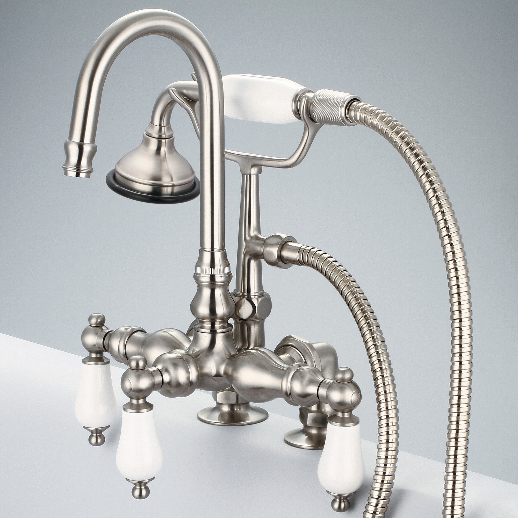 Water Creation | Vintage Classic 3.375 Inch Center Deck Mount Tub Faucet With Gooseneck Spout, 2 Inch Risers & Handheld Shower in Brushed Nickel Finish With Porcelain Lever Handles Without labels | F6-0013-02-PL Water Creation | Vintage Classic 3.375 Inch Center Deck Mount Tub Faucet With Gooseneck Spout, 2 Inch Risers & Handheld Shower in Brushed Nickel Finish With Porcelain Lever Handles Without labels | F6-0013-02-PL