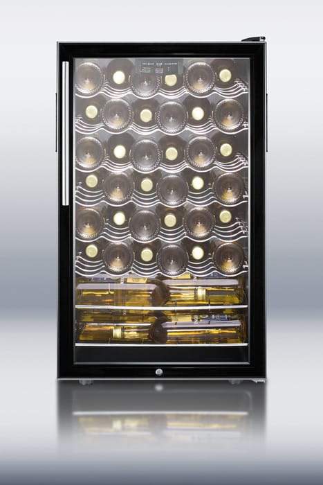 Summit Commercial Freestanding Wine Cellars 4.5 cu. ft. Freestanding Commercial Wine Cellar with 40 Bottle Capacity, 6 Scalloped Shelves, 2 Flat Shelves, Automatic Defrost, Interior Lighting and Reversible Door Hinge: Pro Handle Summit Commercial Freestanding Wine Cellars 4.5 cu. ft. Freestanding Commercial Wine Cellar with 40 Bottle Capacity, 6 Scalloped Shelves, 2 Flat Shelves, Automatic Defrost, Interior Lighting and Reversible Door Hinge: Pro Handle
